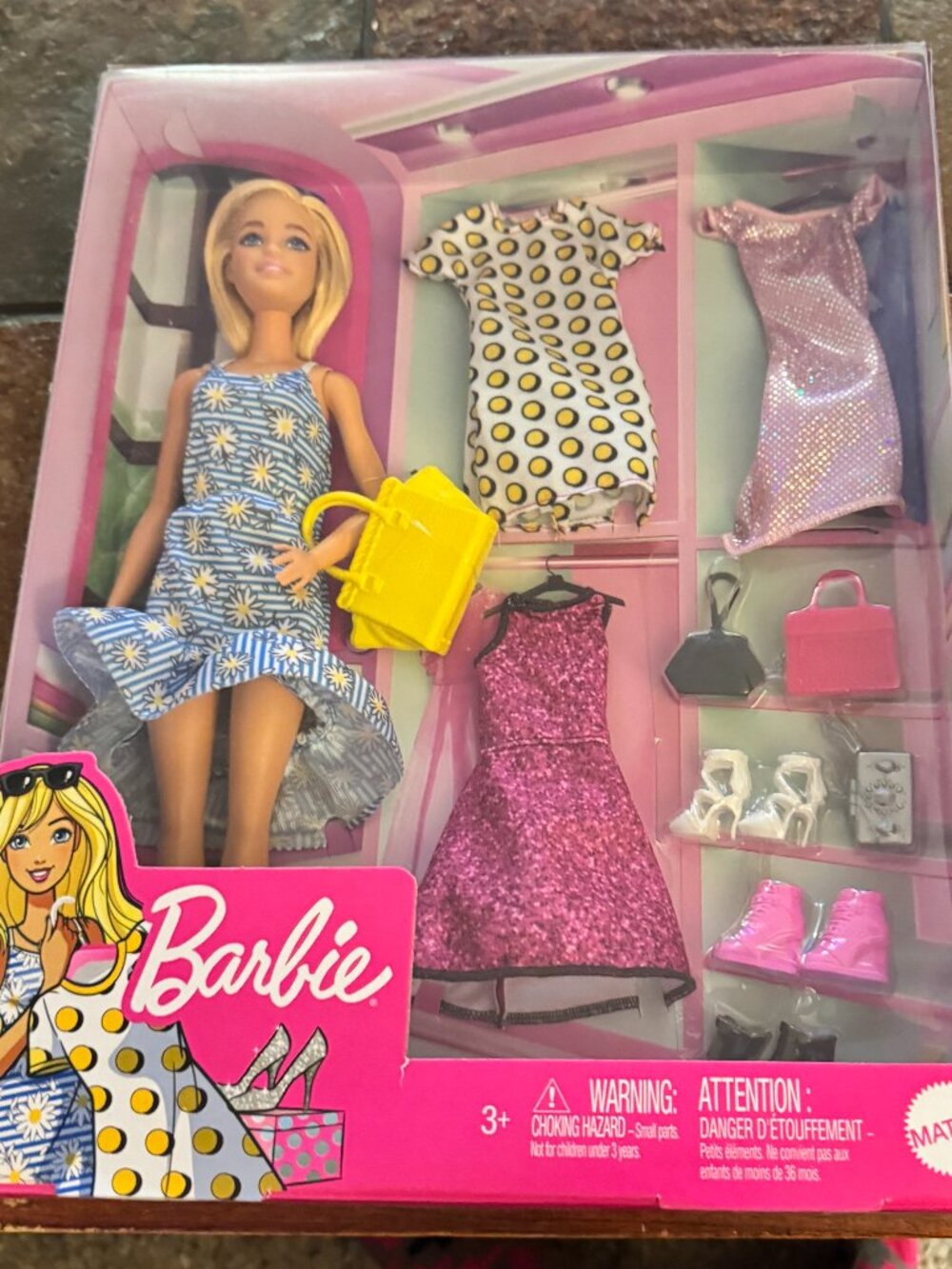 Barbie with clothes and accessories